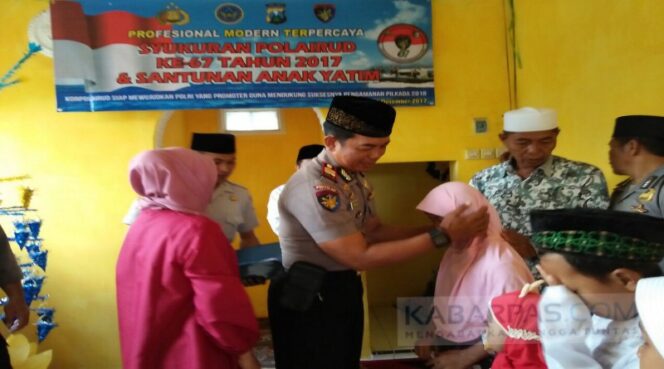 
Peringati HUT Polair ke-67, Satpolair Polres Banyuwangi Ajak Anggota Santuni Anak Yatim