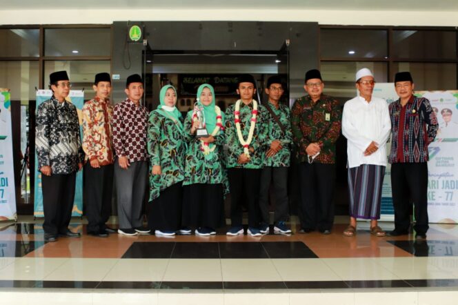 
Bawa Gelar Juara, Kedatangan Kafilah MTQ Nasional Asal Kota Pasuruan Disambut Meriah