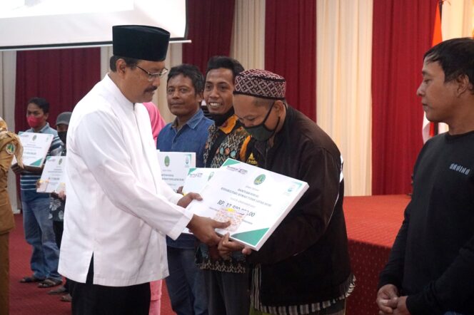 
285 KPM di Kota Pasuruan Terima Bantuan RTLH